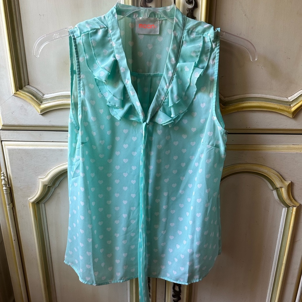 Beautiful heart detail blouse. New, no tags